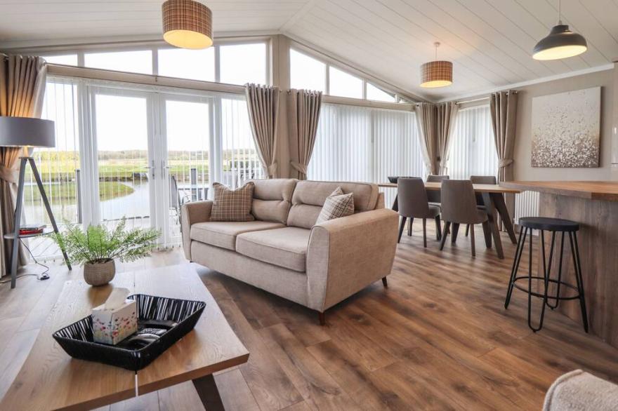 101 WATERS EDGE, with a garden in Marston, Lincolnshire