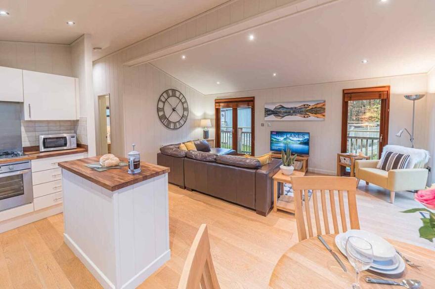 Pass the Keys | Lovely Lakeland lodge with private parking
