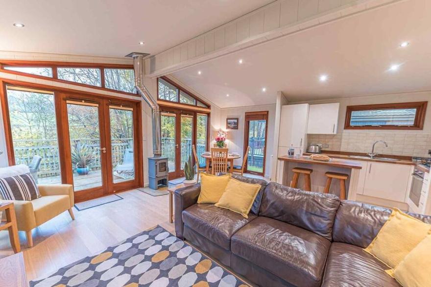 Pass the Keys | Lovely Lakeland lodge with private parking