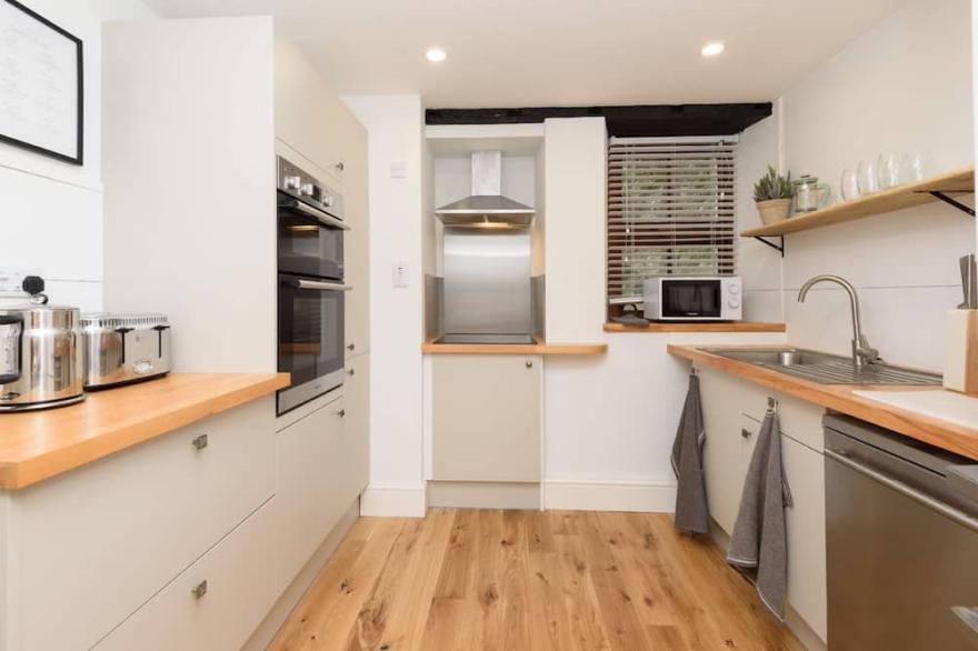 Fabulous town centre property with river views.