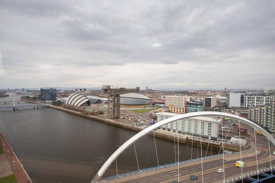 Rare Top Floor Duplex Overlooking the River Clyde