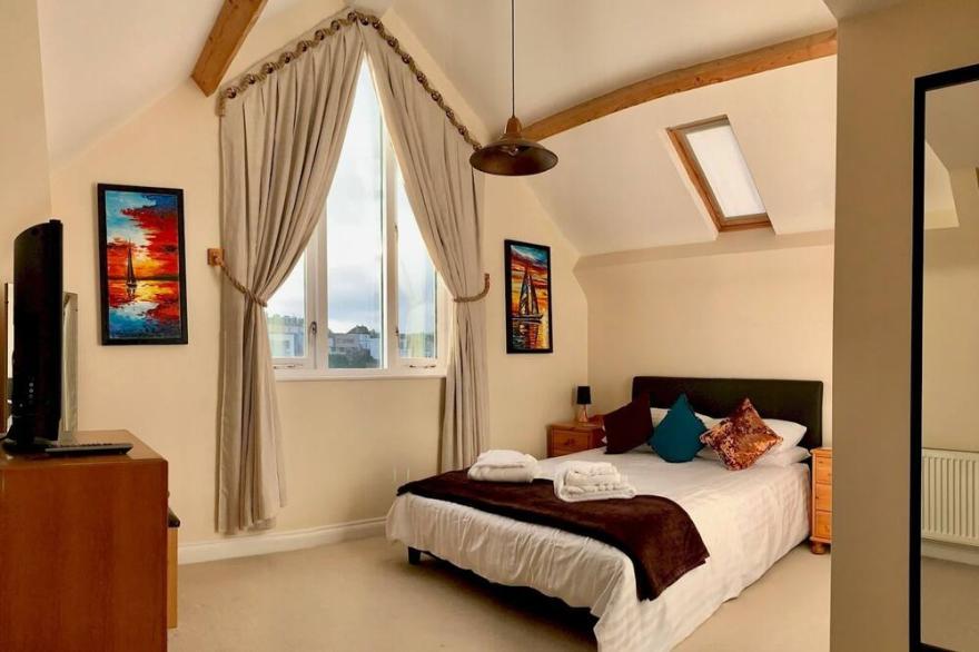 Pass the Keys | Spacious Converted Sail Loft Sunny Family Terrace