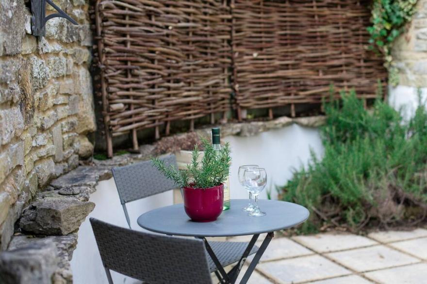 Hope Cottage, Naunton - pet friendly with a wood burner and garden