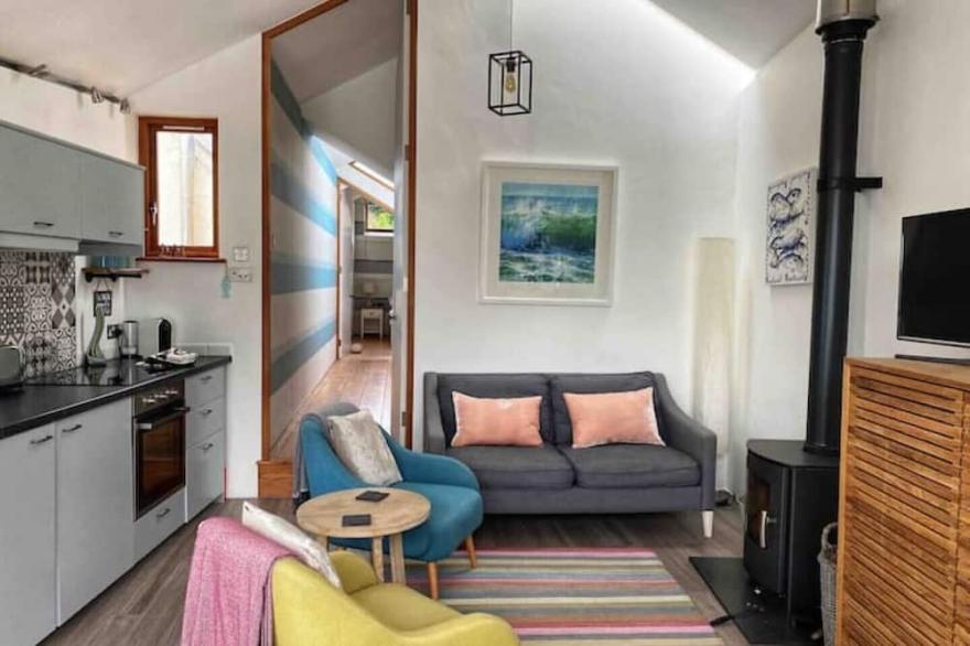 Contemporary cottage in coastal village