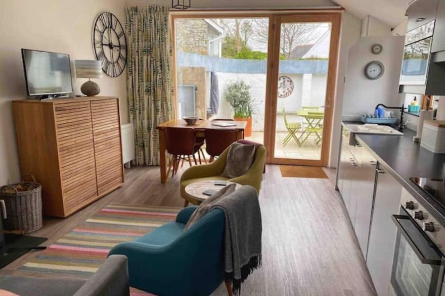 Contemporary cottage in coastal village