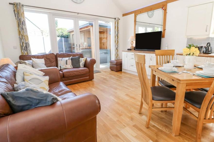 KENSA, pet friendly, country holiday cottage, with hot tub in St Day