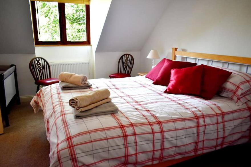 Character 4 bedroom lodge in a beautiful 1/4 acre setting.