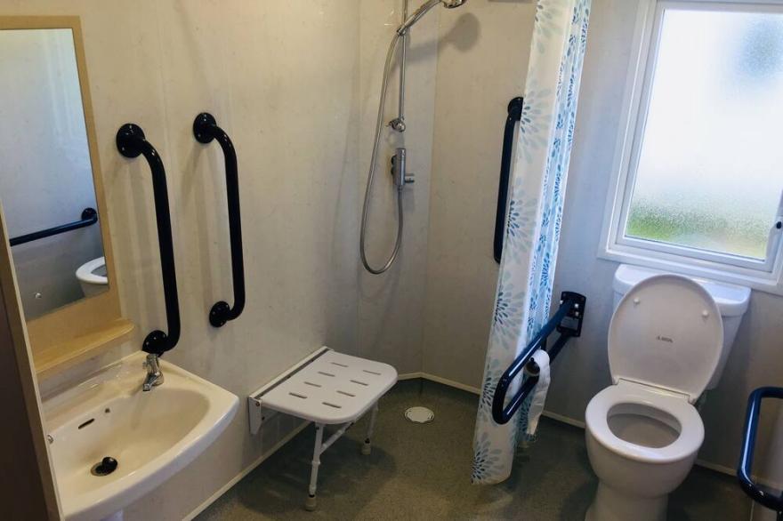 Modern 2 bedroom caravan.  Disabled friendly with wetroom & fab sun deck.