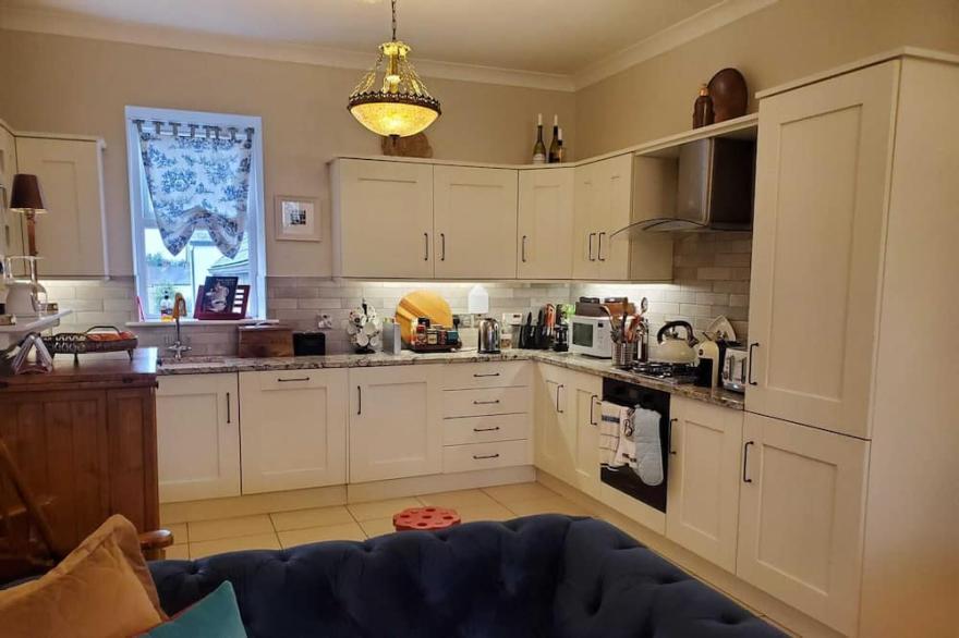 Step into luxury at this exquisite two storey apartment