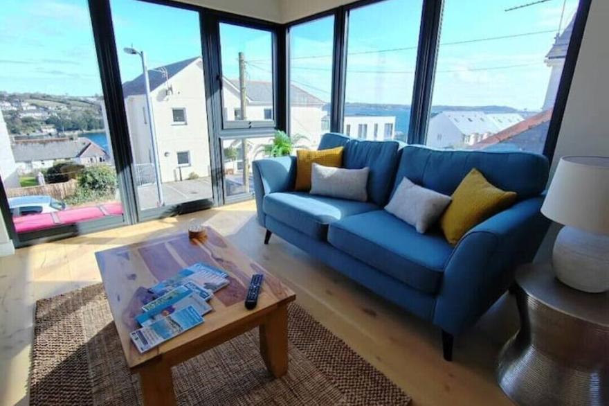 Modern open plan house, sea views and hot tub