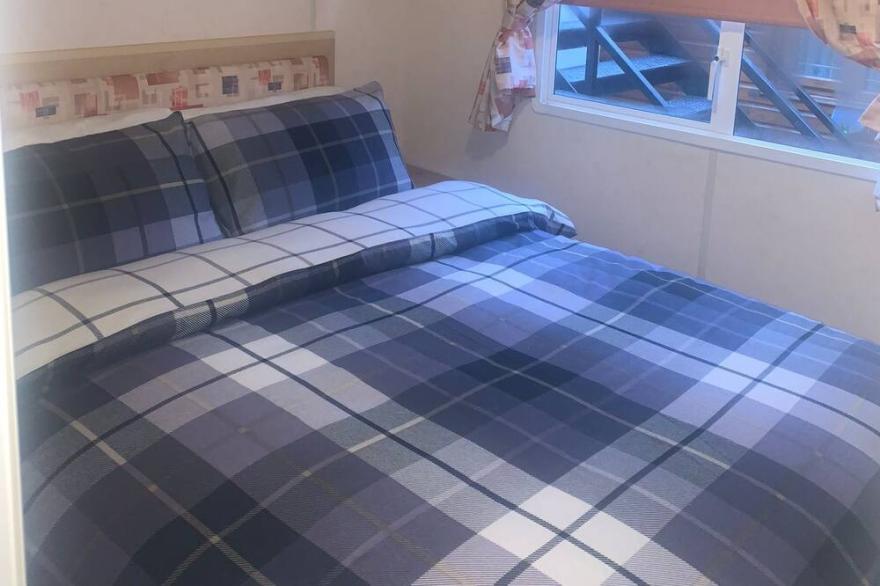The Rabbit Warren - a 6 berth caravan with private patio and hot tub