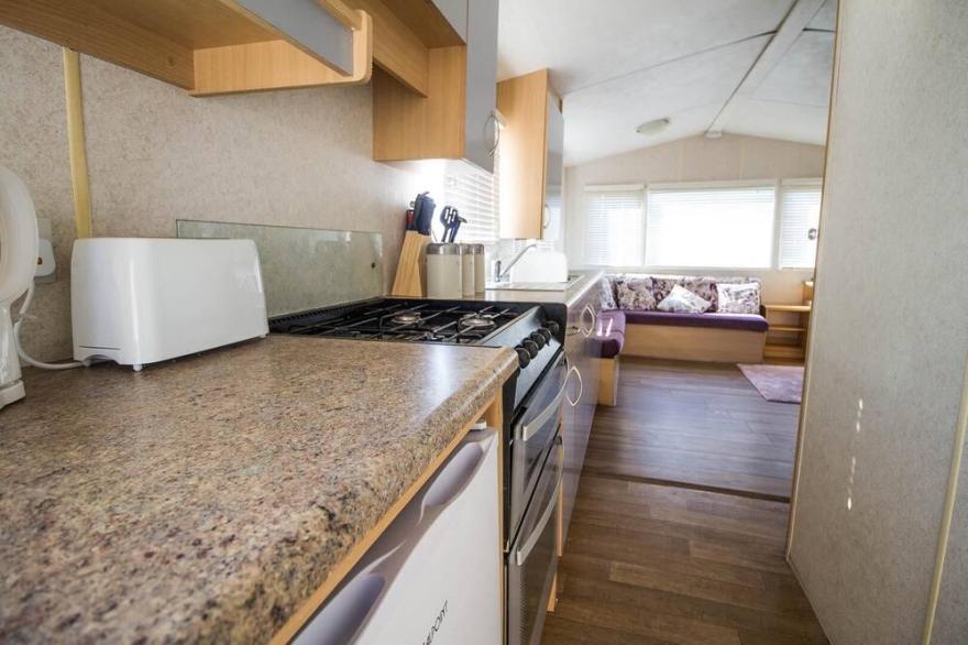 6 berth caravan with decking at Martello Beach Holiday Park in Essex ref 29016Y