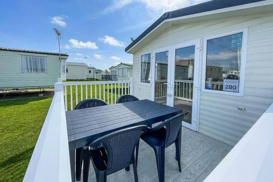 8 berth caravan with decking to hire at Naze Marine in Essex ref 17280C
