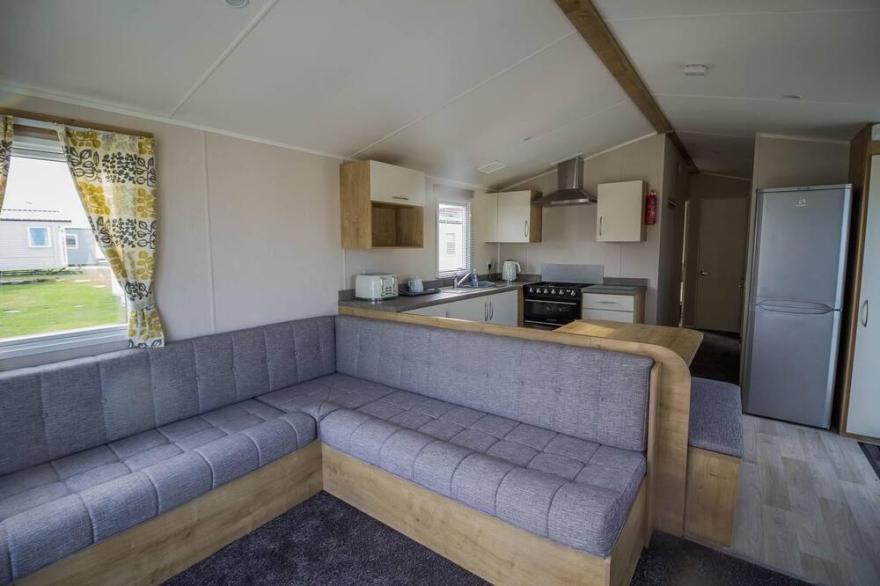 8 berth caravan with decking to hire at Naze Marine in Essex ref 17280C
