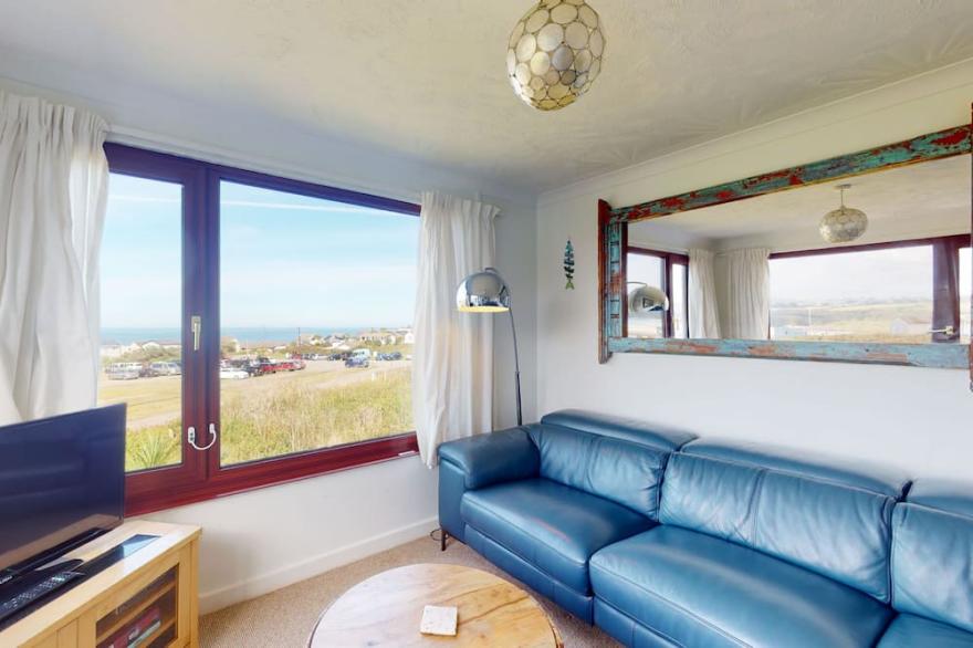 Beach front location with a sunny enclosed garden, three bedrooms and views of St Ives