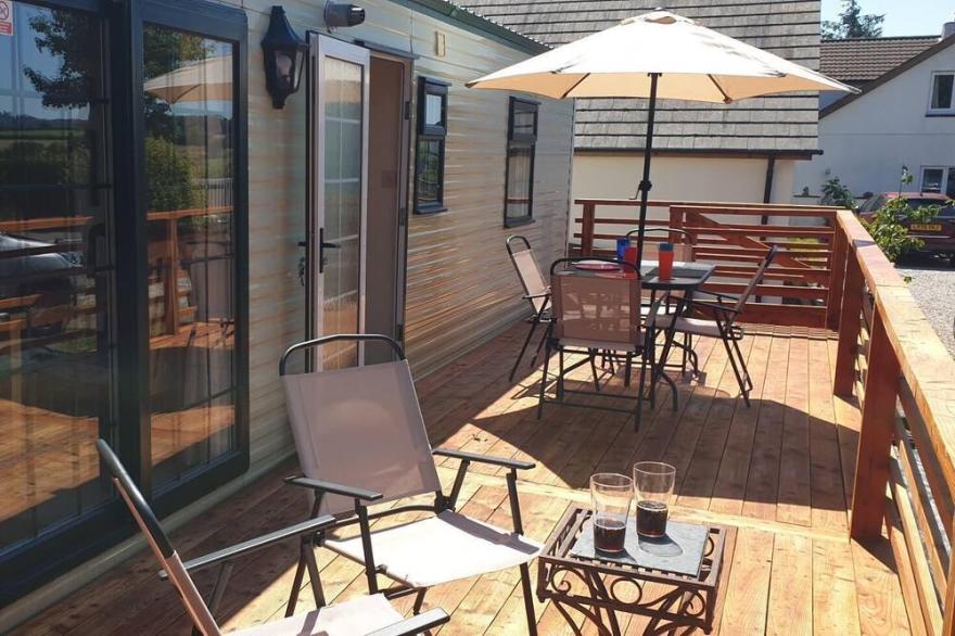 Little Malory, a spacious mobile home located on private land