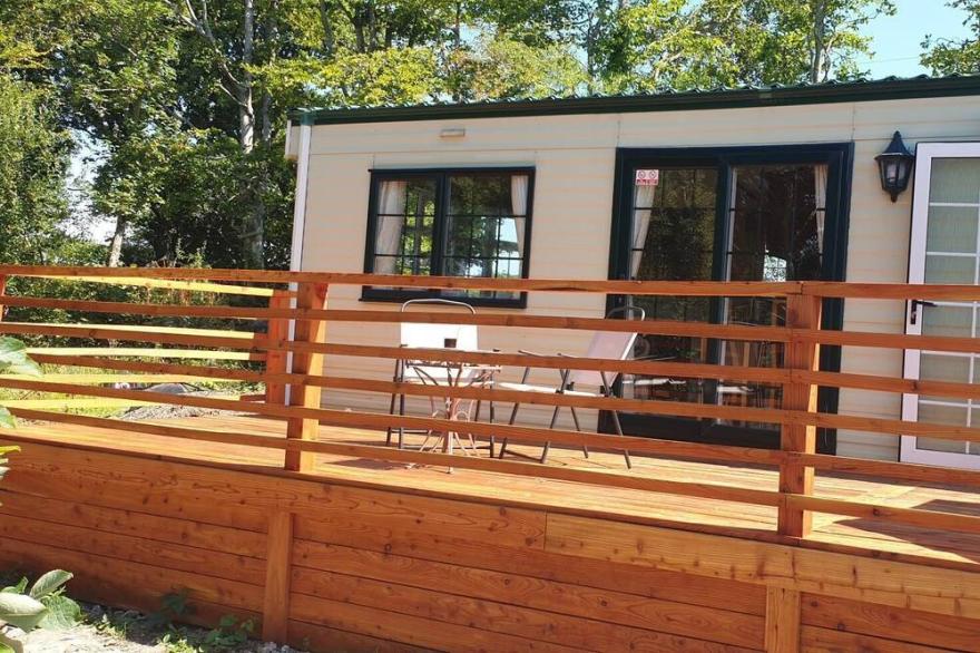 Little Malory, a spacious mobile home located on private land