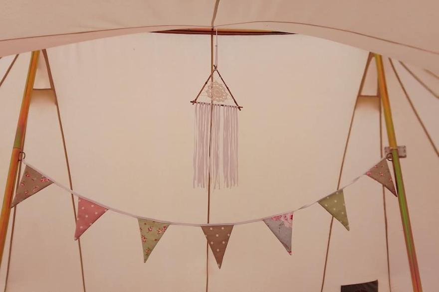 Luxury couples emperor bell tent, with log burner