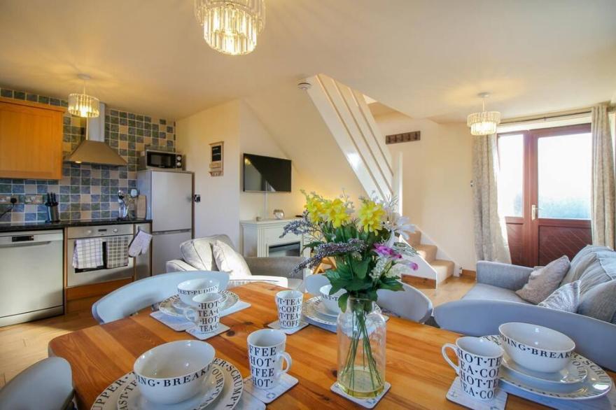 Barn Cottage, stunning Sea views in a cosy cottage in Bude, pet friendly
