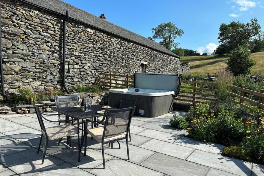 MEADOW SYKE BARN, pet friendly, with hot tub in Bampton, Cumbria