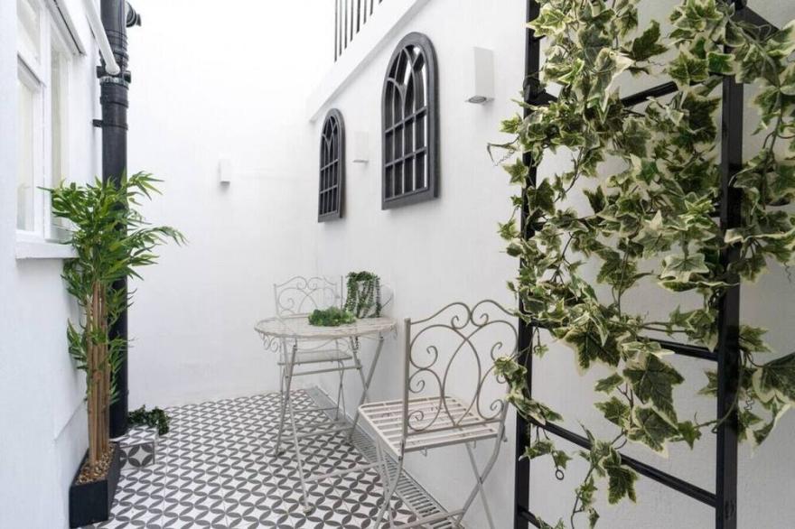 Central Apartment - with Patio + Free Parking!