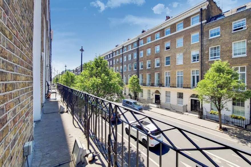 Beautiful One Bedroom Apartment with Balcony & AC