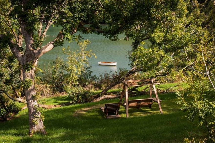 Goodshelter Bay -  a large modern waterfront house with private slipway