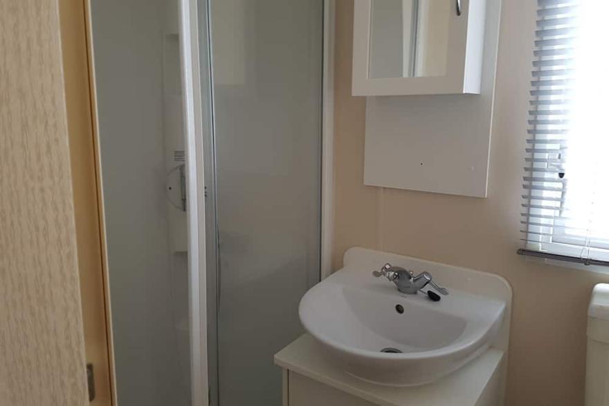 8 berth (3 bed caravan) centrally heated and double glazed