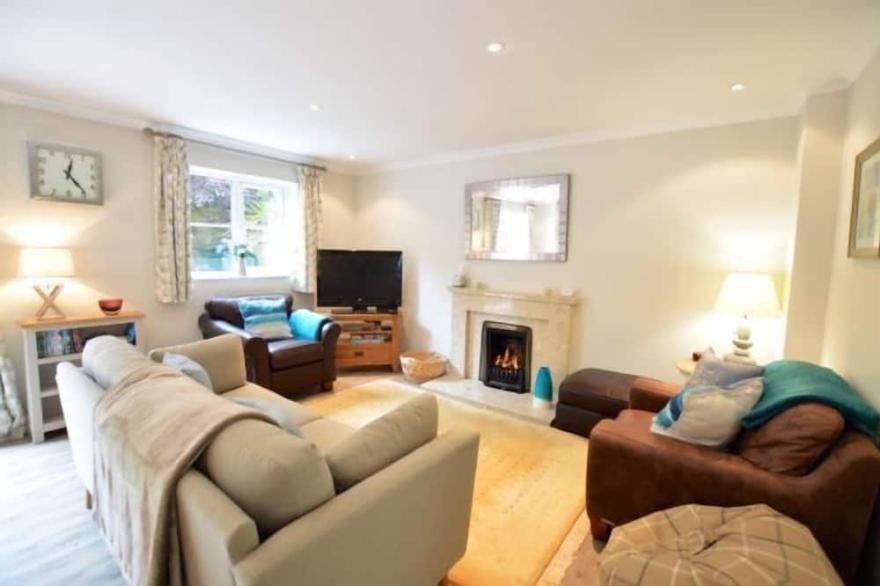 A spacious, detached four-bedroom holiday home just a mile from the beach.