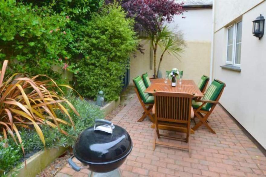 A spacious, detached four-bedroom holiday home just a mile from the beach.