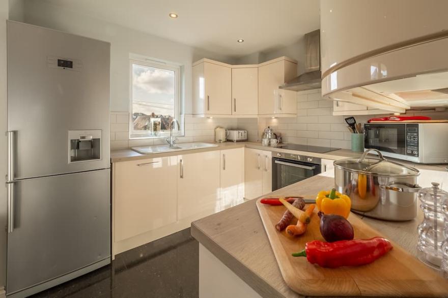 A fabulous beach house with sea views and a lovely, enclosed garden.