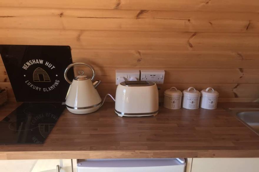 Luxury glamping pod with hot tub