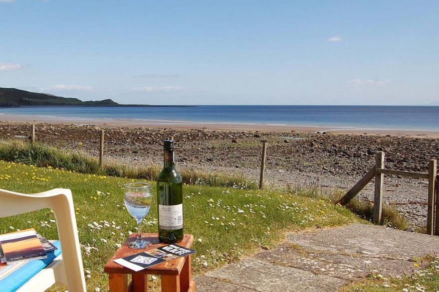 The Haven nestling in an idyllic setting on the shore of Luce Bay in Galloway a