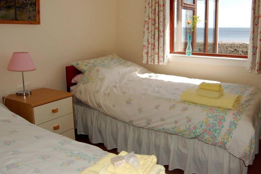 The Haven nestling in an idyllic setting on the shore of Luce Bay in Galloway a