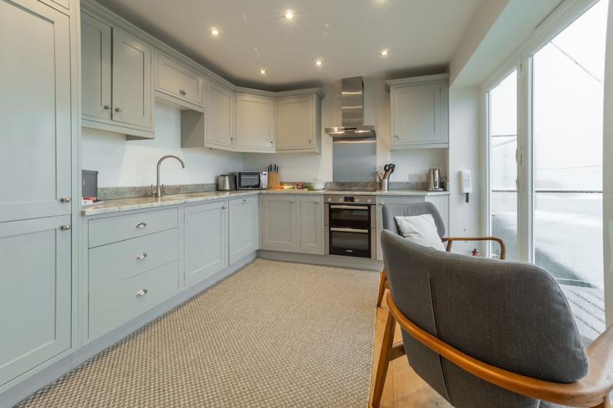 Superbly appointed accommodation, and a soothing hot tub on the decked balcony.