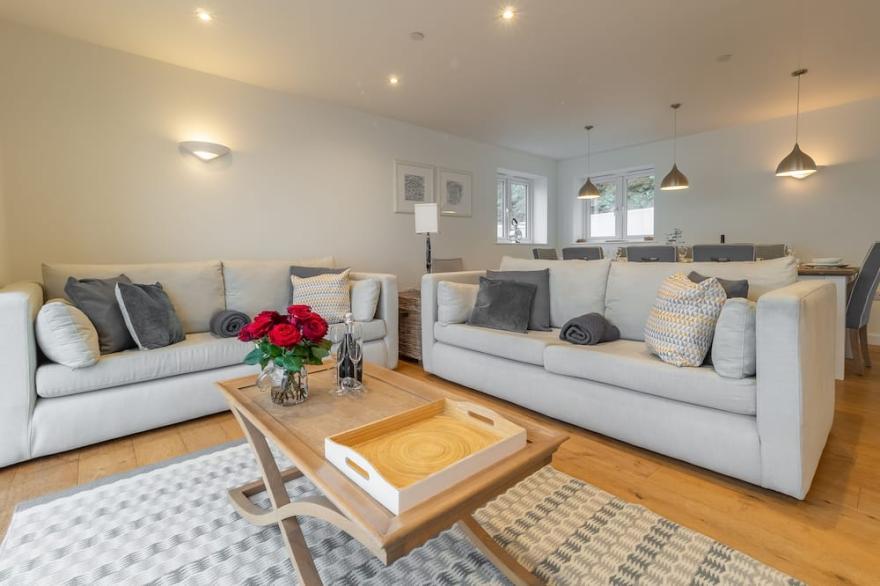 Superbly appointed accommodation, and a soothing hot tub on the decked balcony.