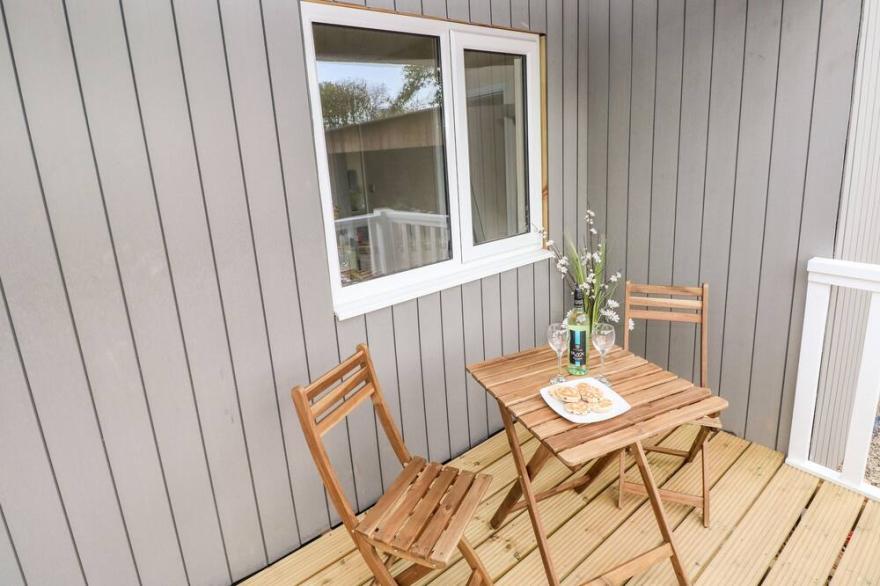 SKOMER LODGE (BIER WOOD LODGES), pet friendly in Manorbier