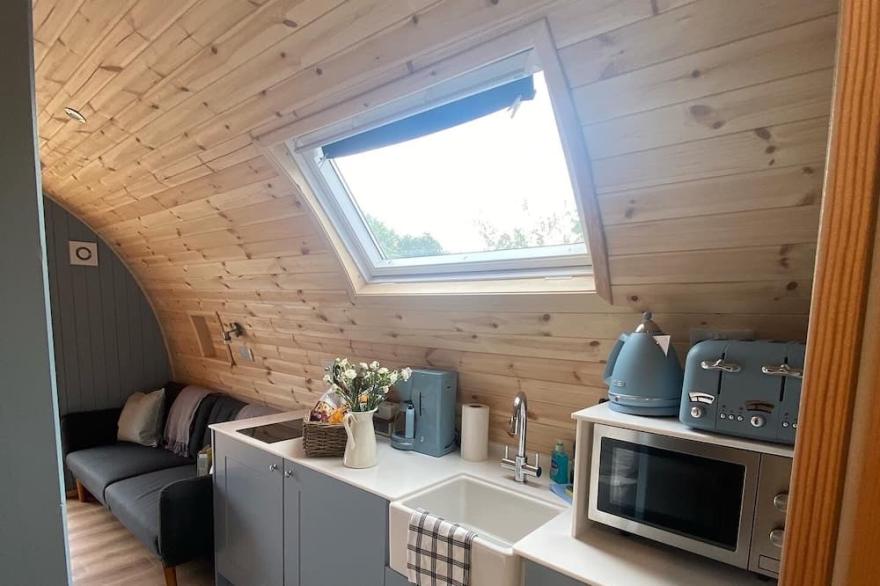 Wild Luxury Bluebell Glamping Pod with Wood Fired Hot Tub in quiet rural setting