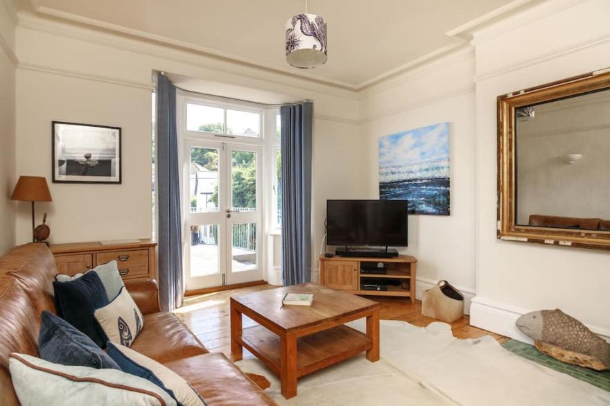 Comfortable 7-bedroom house with estuary views and parking