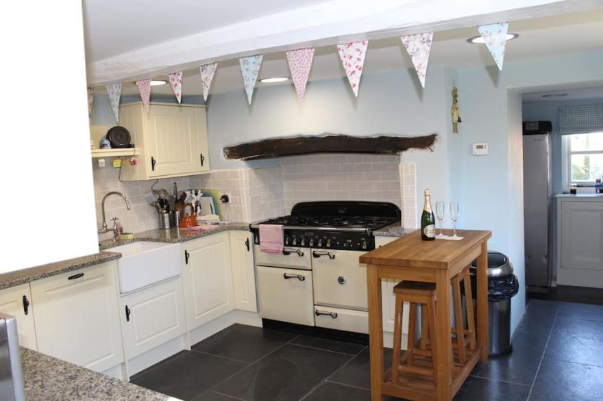 400 year old cottage is in the lovely North Devon village of West Down