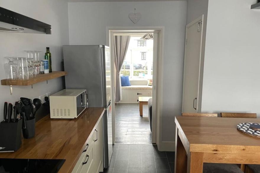 Waterfront 2 bedroom property with superb harbour views.