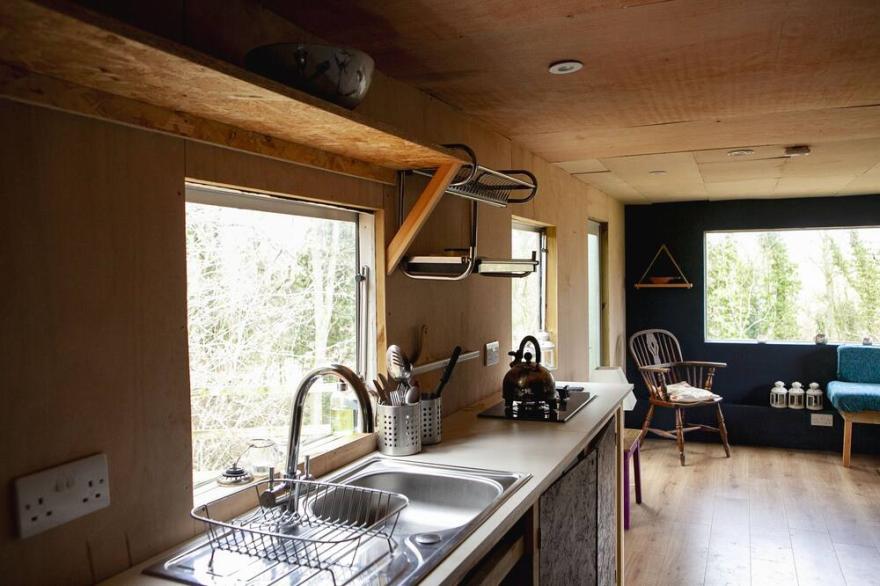 Luna Lodge, nestled in field and woodland surroundings