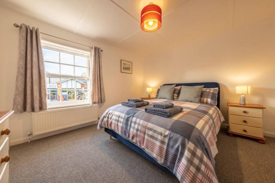 The Town House is a fabulous two bedroom traditional cottage presented with a modern twist.
