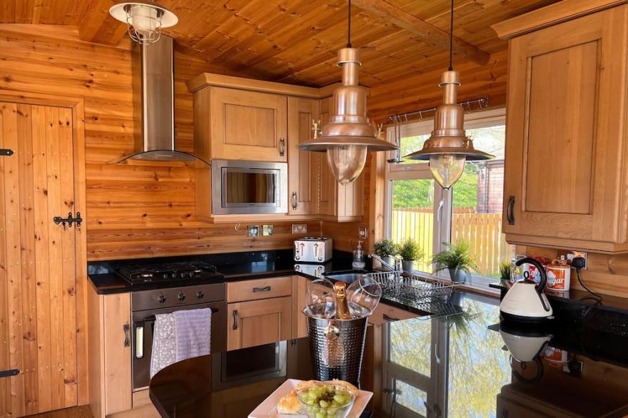 Enjoy Stag's Head, a luxury log cabin style lodge