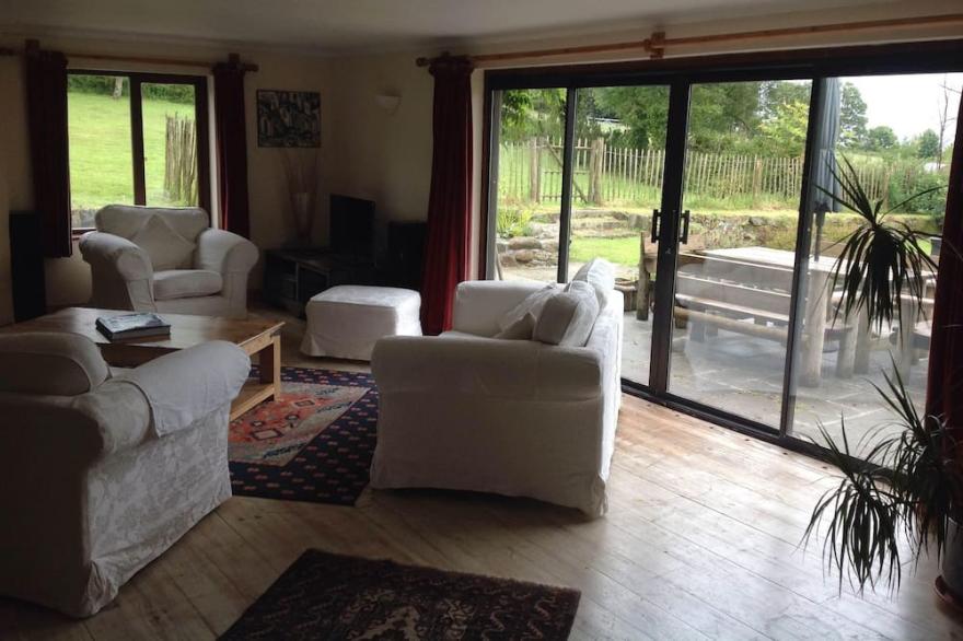 Large family Farmhouse with sea views, large gardens, woodland walks