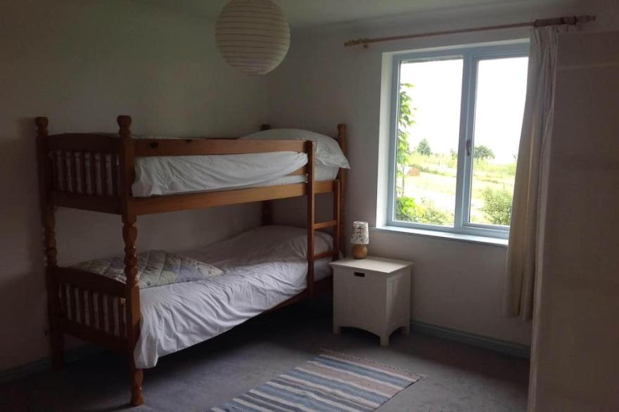 Large family Farmhouse with sea views, large gardens, woodland walks