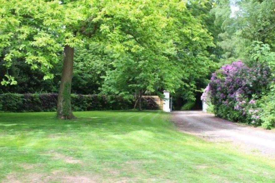 The Lodge Overlooks Rolling Countryside, Exe Estuary and the sea beyond.