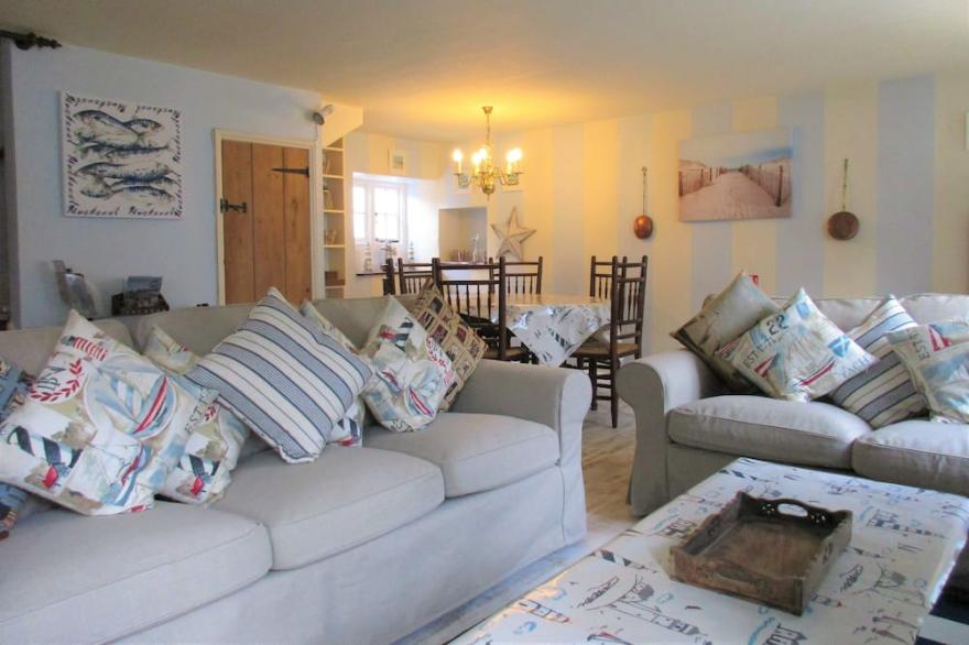 Sunbeam Cottage nestling in the heart of Branscombe village with a parking space