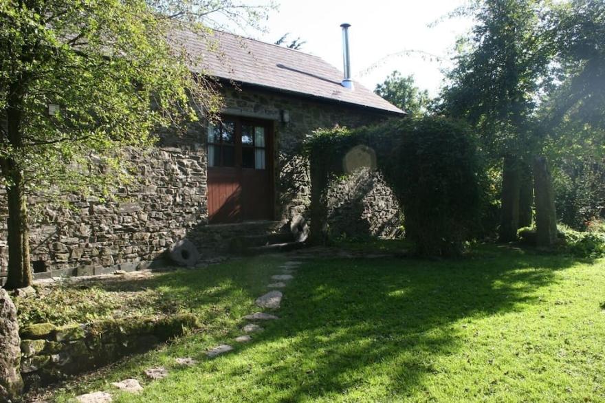 Delightful open plan barn conversion with piano in historic Dartmoor village