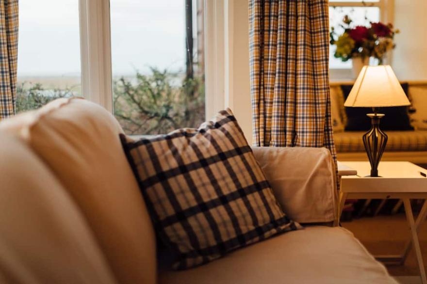 Gorgeous flint cottage overlooking the marshes, walking distance to beach